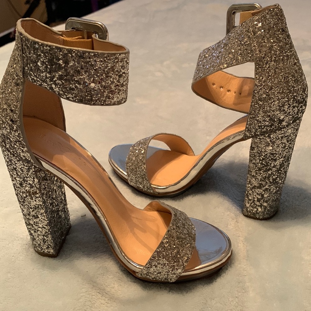 Silver glitter high heels.